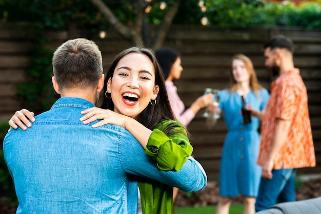 Free Photo happy young girl hugging a friend