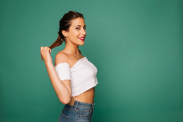 Happy young girl with plait