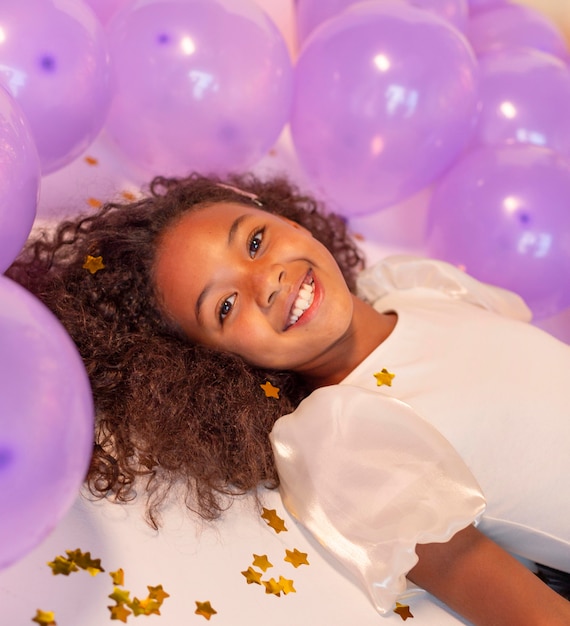 Happy young pretty girl at festive party