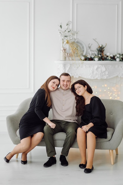 Happy young teenagers hugging having fun  Shooting on a camera