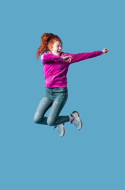 Free Photo happy young woman jumping