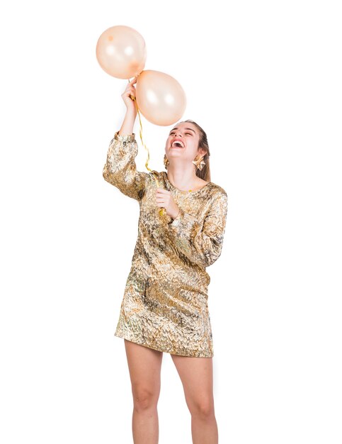 Happy young woman with balloons 