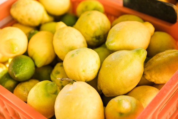 Free Photo harvest heap of fresh ripe organic yellow lemon at local farmers market