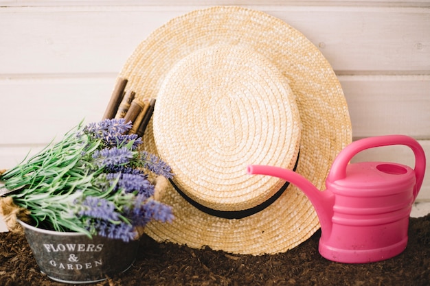 Free photo hat and watering pot