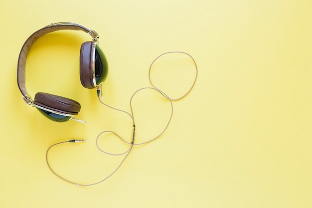 Free Photo headphones on yellow