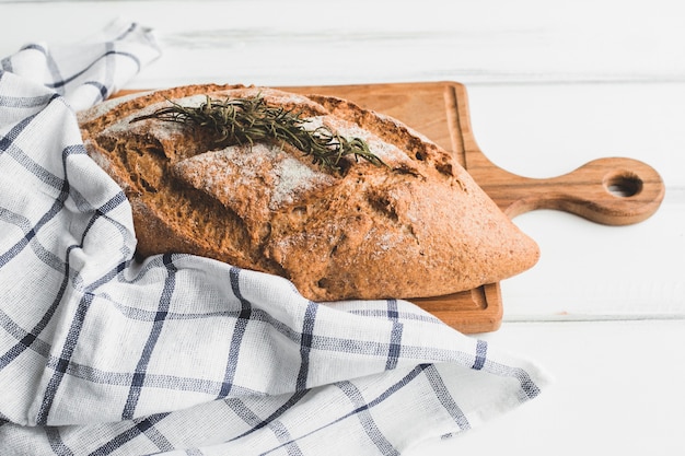 Free Photo healthy bread loaf with aromatic herb