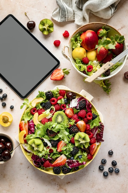 Free photo healthy breakfast and device screen flat lay