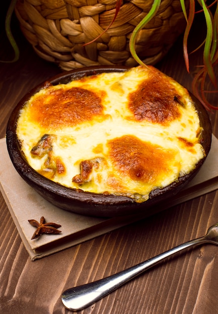 Healthy breakfast. Lasagna, or casserole, or a meat pie baked in the oven with melted cheese on the top