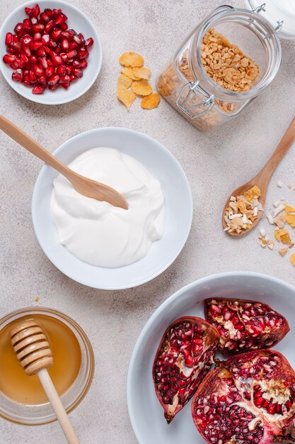 Healthy breakfast with pomegranate and yogurt