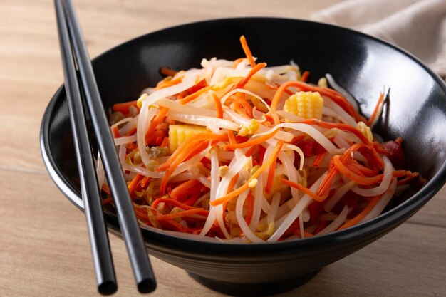 Free Photo healthy chinese cabbage salad in bowl on wooden table