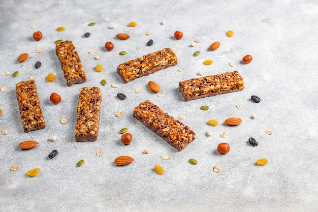 Healthy delicios granola bars with chocolate, muesli bars with nuts and dry fruits