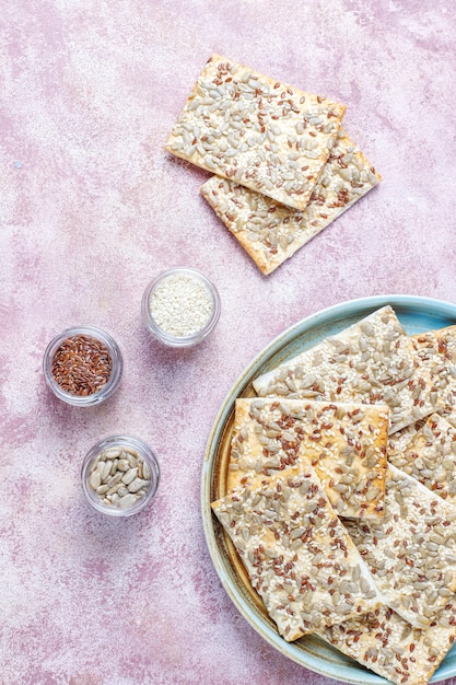 Free photo healthy fresh baked gluten free crackers with seeds.