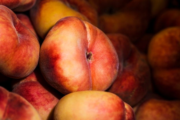 Free Photo healthy harvest peaches in market for sales