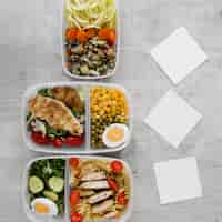 Free photo healthy meal in containers arrangement