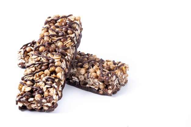 Free Photo healthy muesli bars with nutsseeds and black chocolate isolated on white background