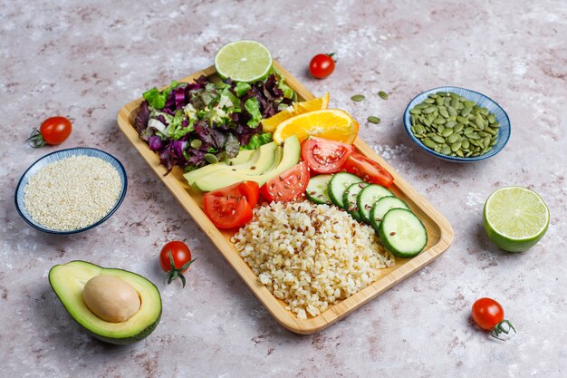 Healthy vegetarian balanced food concept, fresh vegetable salad, buddha bowl