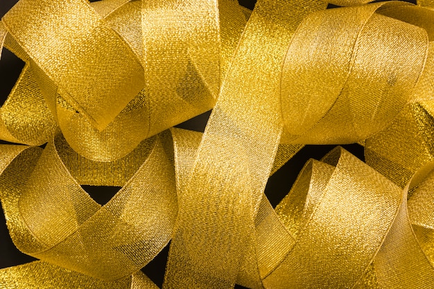 Free Photo heap of golden ribbon