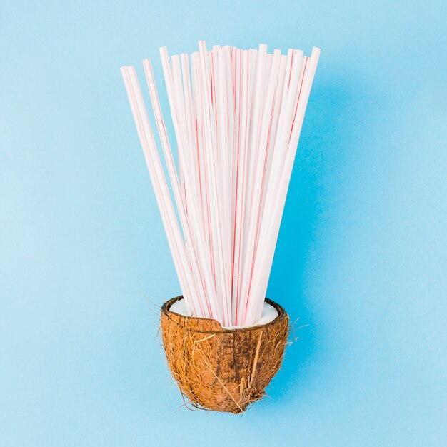 Heap of plastic straws in coconut