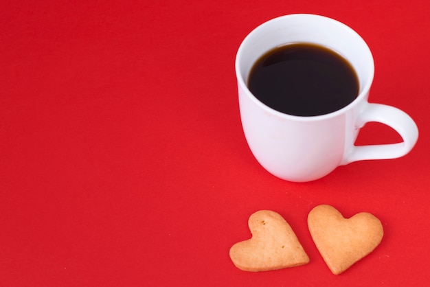 Free photo heart cookies with coffee cup