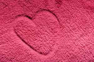 Free photo heart drawn on a carpet