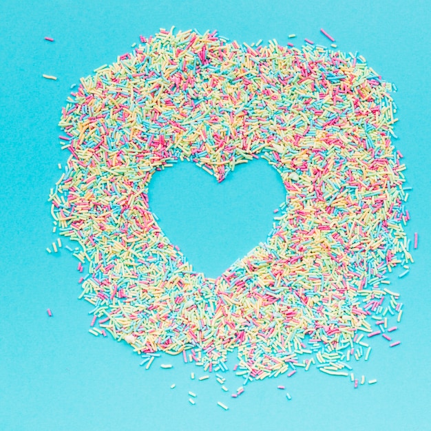 Free photo heart in heap of sprinkles