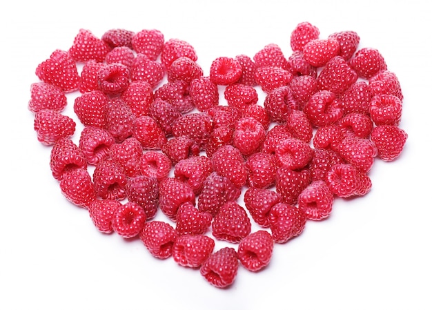 Free photo heart made out of raspberries