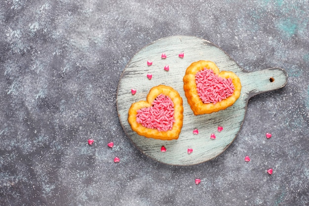 Free photo heart shaped cakes for valentine's day.