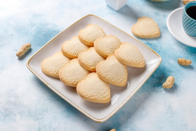 Heart shaped cookies with peanut.