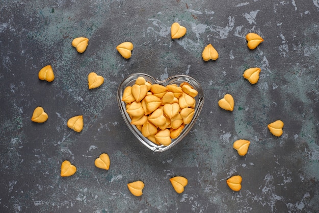 Heart shaped crackers in a heart shaped bowl.