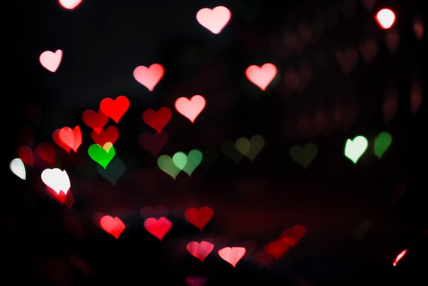 Free Photo heart shaped neon lights background