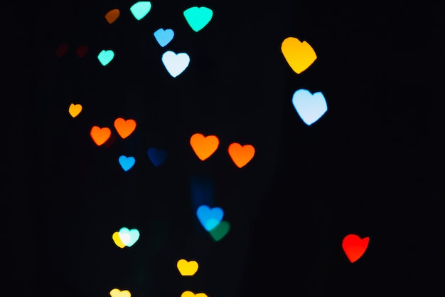 Free photo heart-shaped specks of various colors