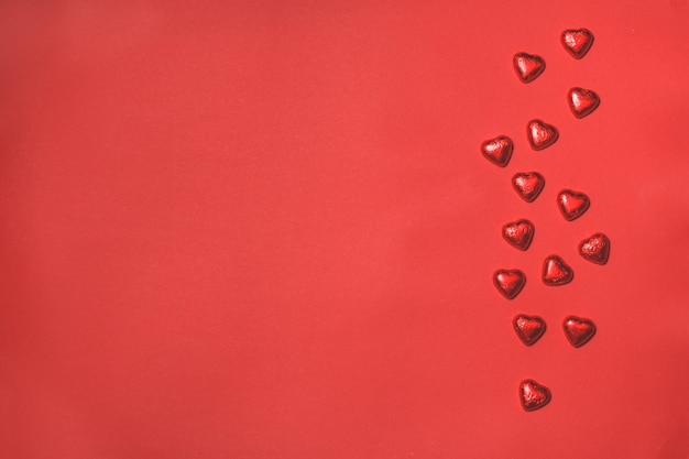 Free Photo hearts on a red background