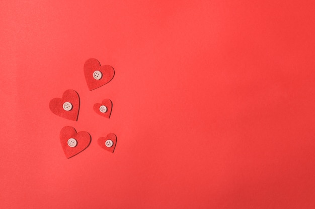 Free Photo hearts on a red background