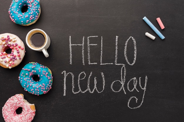 Hello new day with doughnut collection and coffee