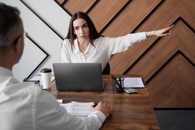 High angle angry woman at work