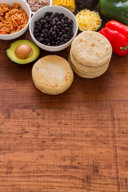 Free Photo high angle of arepas with filling ingredients