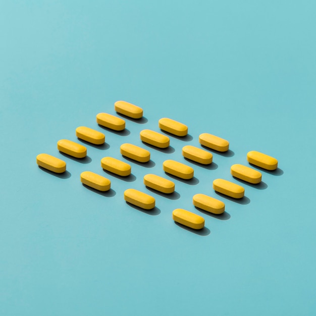 Free Photo high angle of arranged pills