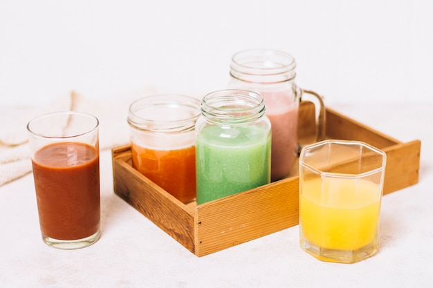 Free photo high angle arrangement of colorful smoothies