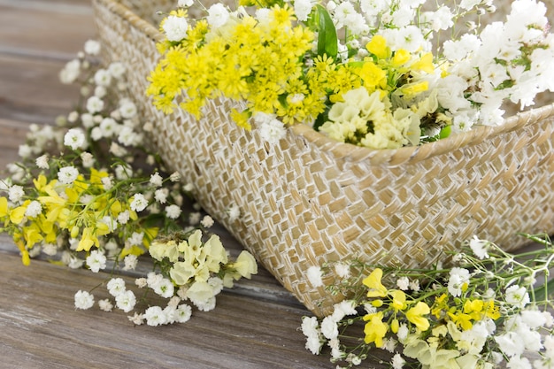 Free photo high angle arrangement with basket of flowers