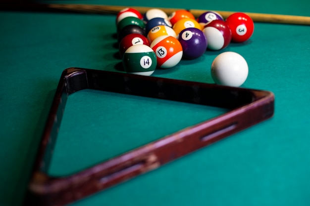 Free photo high angle arrangement with triangle and pool balls