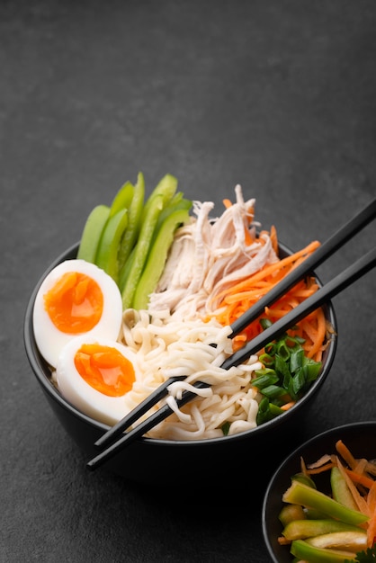 High angle of asian noodles with eggs