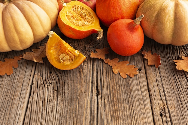 High angle assortment with harvest on wooden background