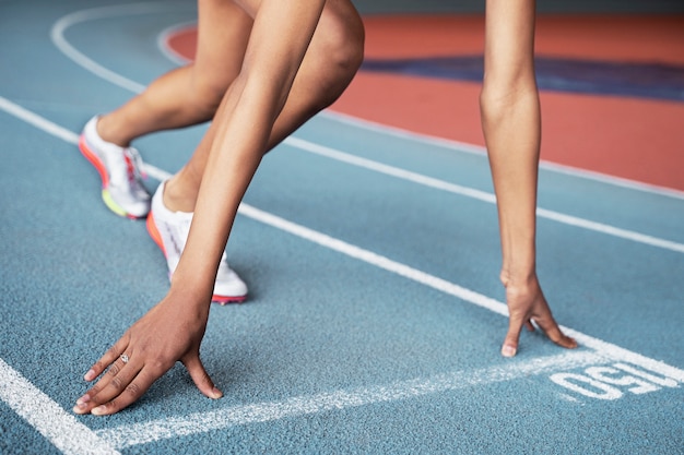 High angle athlete at running starting line