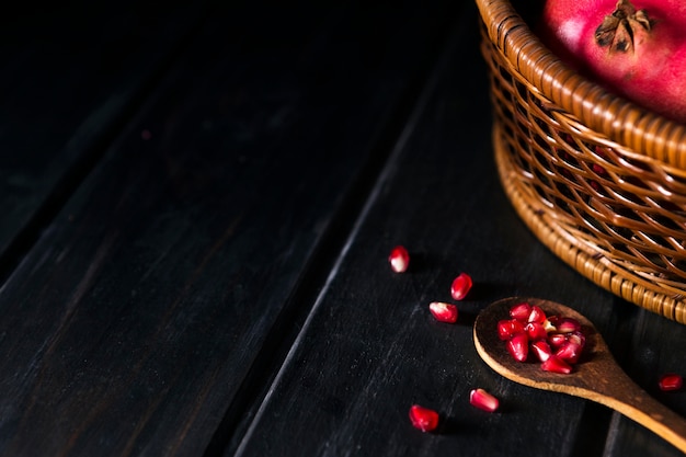 Free photo high angle of autumn pomegranate seeds with copy space