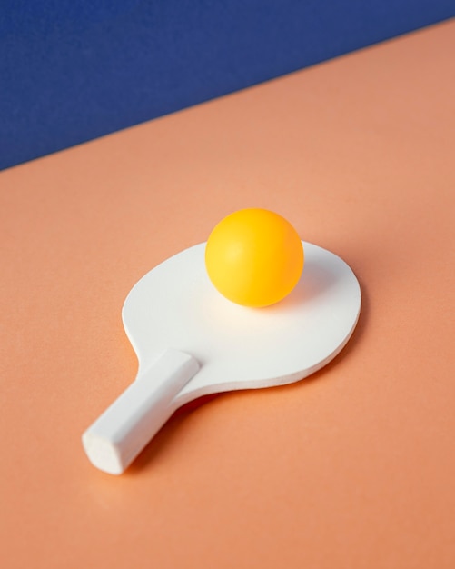 Free photo high angle ball on ping pong paddle