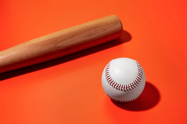 Free photo high angle of baseball with bat