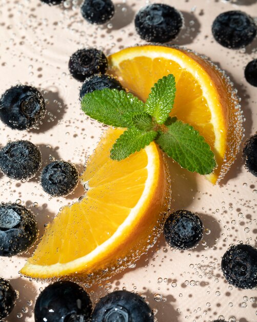 High angle blueberries and sparkling water