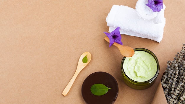 High angle of body butter on plain background with copy space