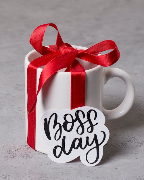 Free photo high angle boss's day arrangement with cup gift