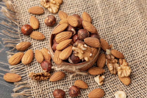 High angle of bowl with almonds and other nuts